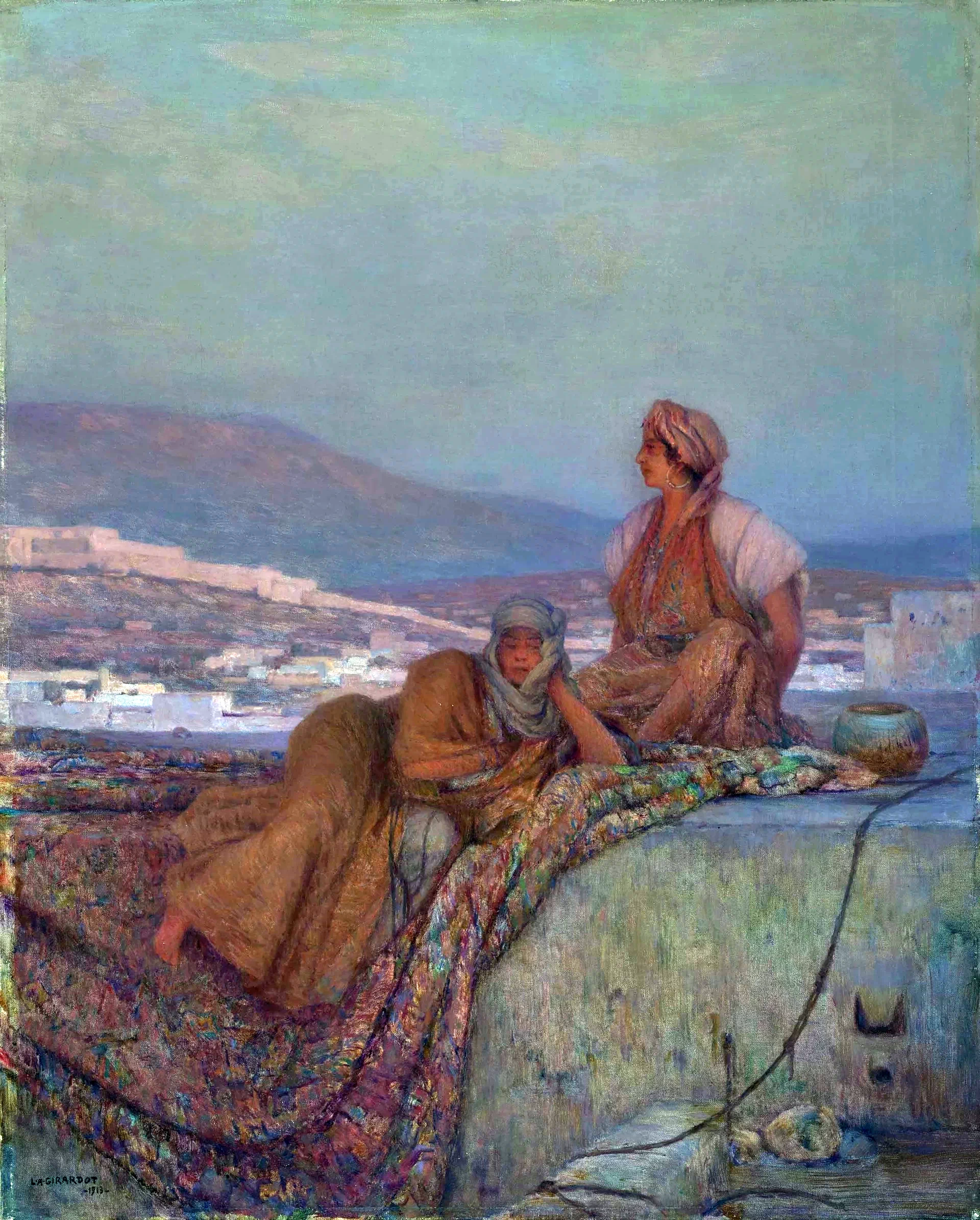 Signore sulla terrazza al tramonto